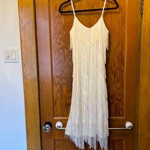 White iridescent Fringed and sequenced party dress. Size 10. Or large.